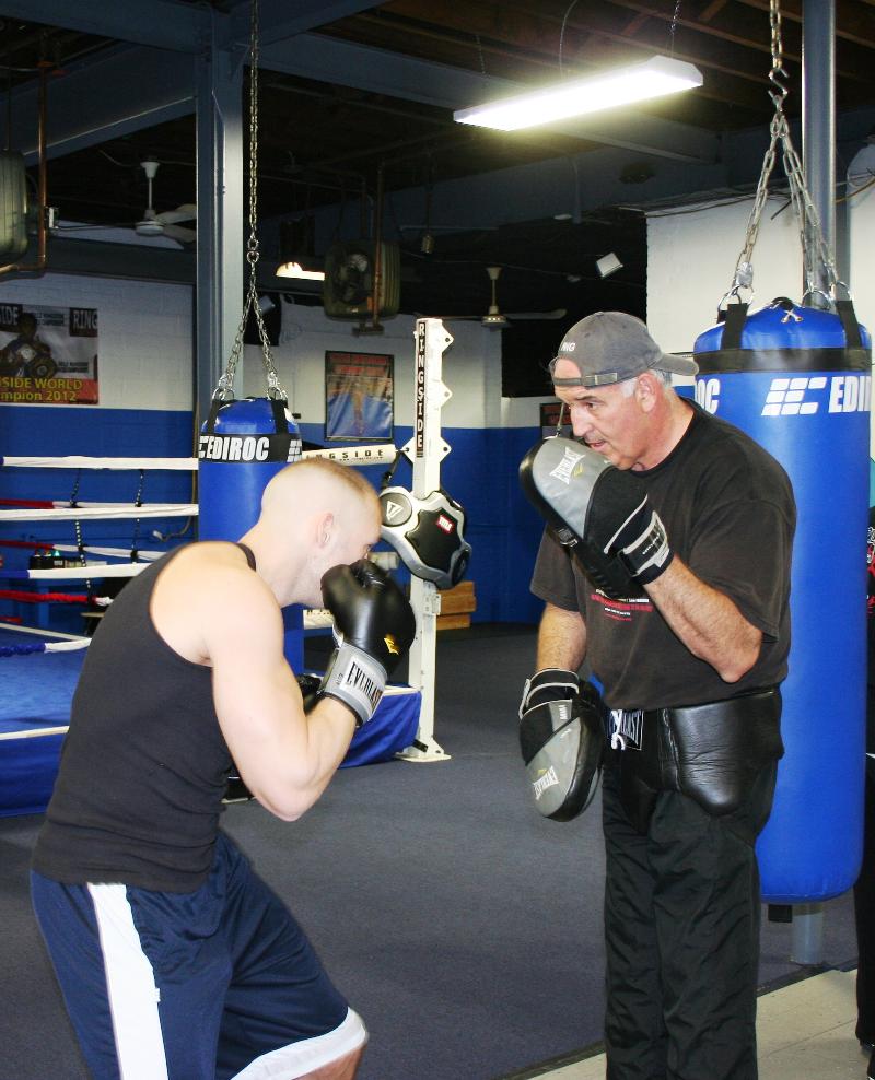 Gerry Cooney (R) holding the mitts for Will Faller   