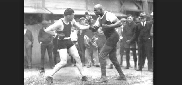 Jack Dempsey spars with George Godfrey